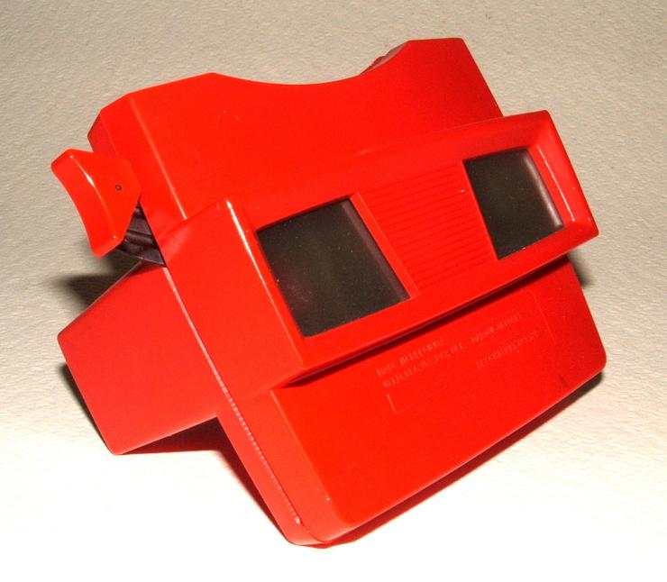 Mattel ViewMaster seen from the front, red.
